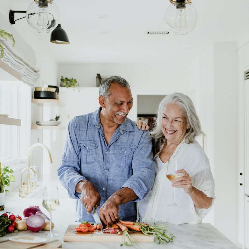 older couple preparing a healthy dinner