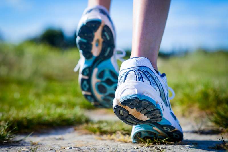 close-up shot of feet in sneakers