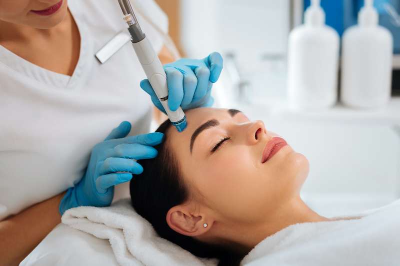 Young girl receiving HydraFacial treatment