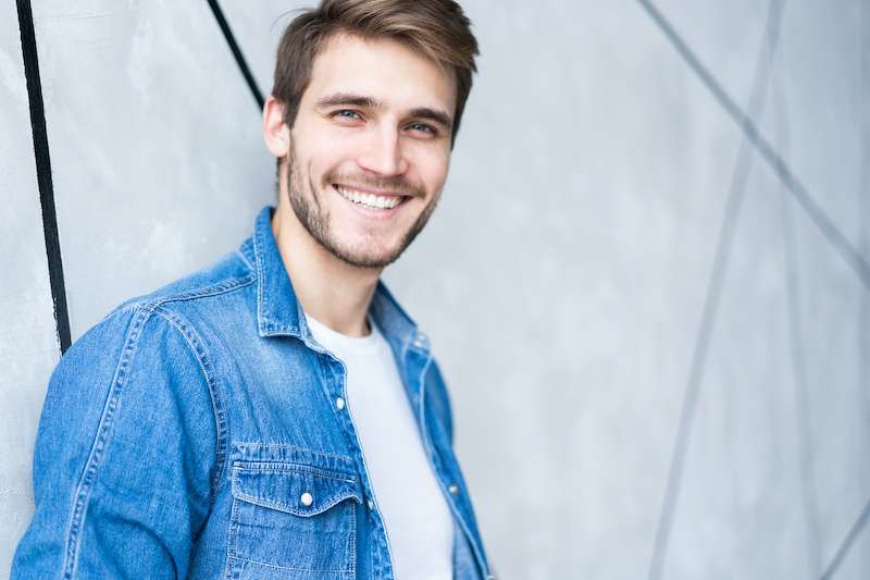 young male smiling