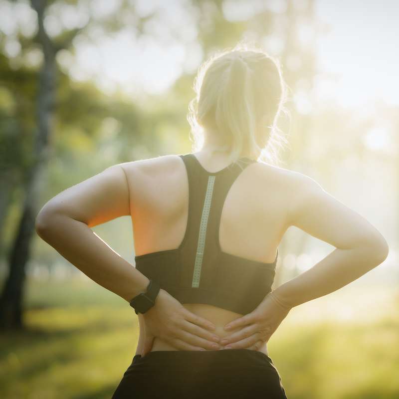 young woman suffering from sport injury