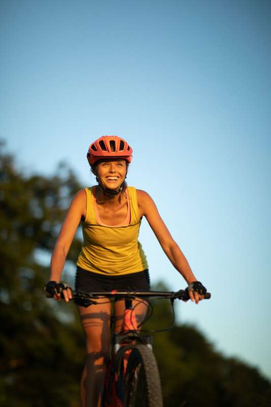 Young woman riding bike