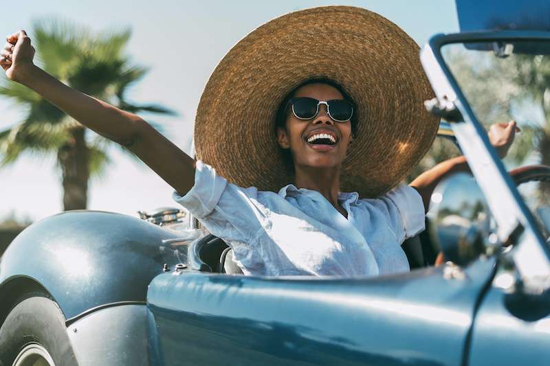 young woman driving a car