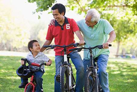 family riding bikes smiling red alert screening at forward healthy lifestyles